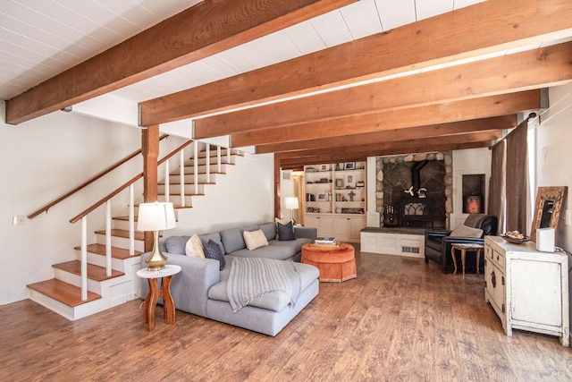 1114 Mount George Ave, Napa, CA 94558 - living room featuring stairs, beamed ceiling, wood finished floors, and a wood stove