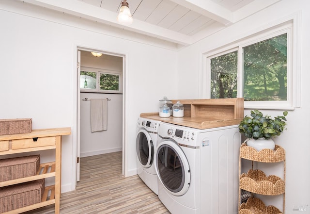 1114 Mount George Ave, Napa, CA 94558 - laundry area featuring separate washer and dryer, light wood-style flooring, plenty of natural light, and baseboards