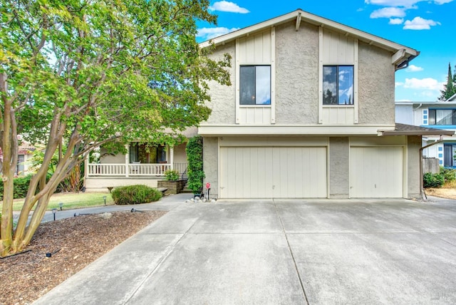 3265 Arroyo Dr, Fairfield, CA 94533 - view of front of house with an attached garage, driveway, a porch, and stucco siding