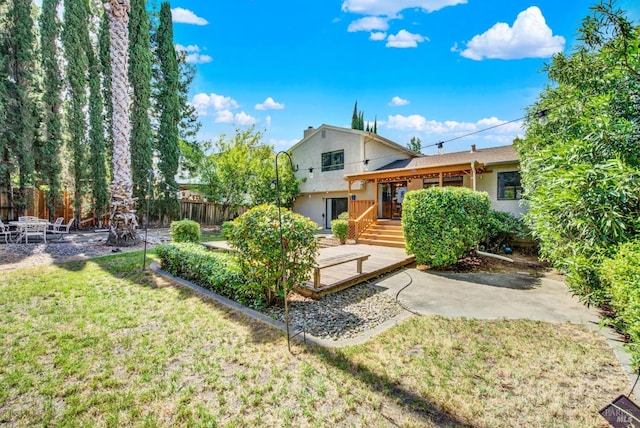 3265 Arroyo Dr, Fairfield, CA 94533 - rear view of property with a deck, a patio area, and stucco siding