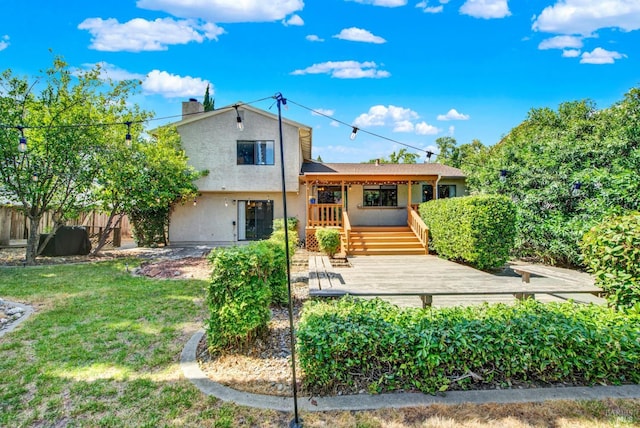 3265 Arroyo Dr, Fairfield, CA 94533 - rear view of property featuring stucco siding and a deck