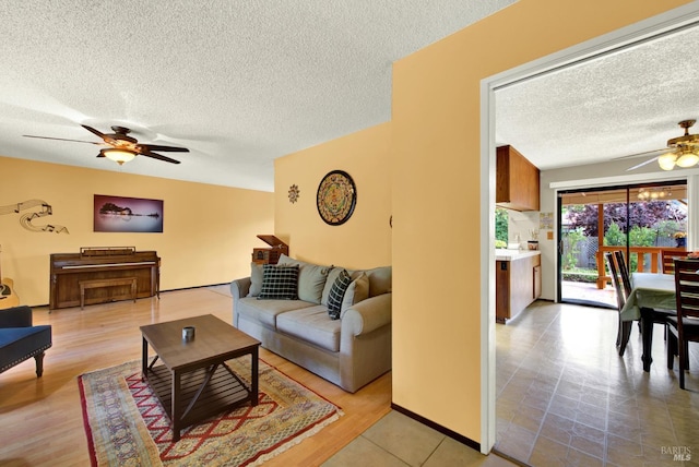 3265 Arroyo Dr, Fairfield, CA 94533 - living area featuring ceiling fan and a textured ceiling