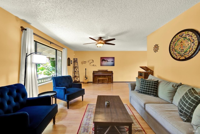3265 Arroyo Dr, Fairfield, CA 94533 - living area with light wood-type flooring, ceiling fan, and a textured ceiling