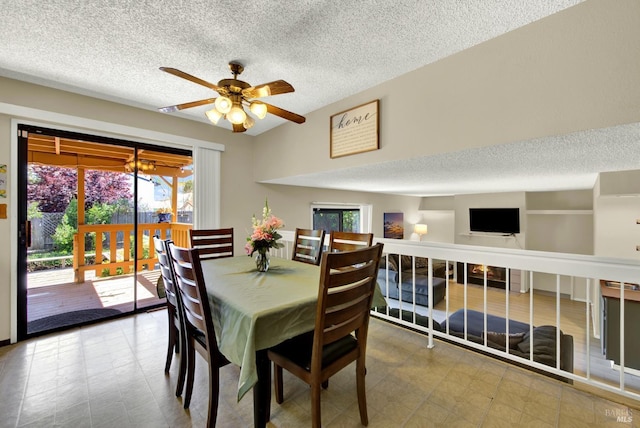 3265 Arroyo Dr, Fairfield, CA 94533 - dining room featuring a textured ceiling, plenty of natural light, and a ceiling fan