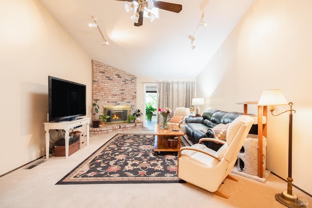2698 Reuben Ct, Napa, CA 94558 - living area with track lighting, a ceiling fan, lofted ceiling, carpet flooring, and a brick fireplace