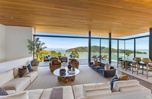 2215 Vistazo St E, Tiburon, CA 94920 - living room with wood ceiling, a wall of windows, a water and mountain view, and wood finished floors