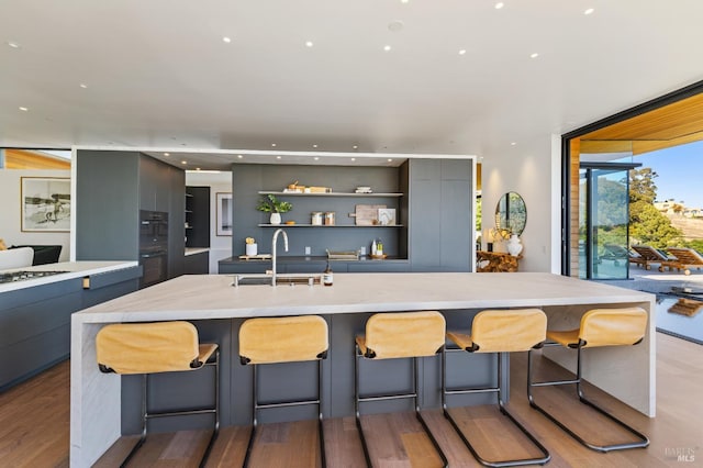 2215 Vistazo St E, Tiburon, CA 94920 - kitchen with a sink, modern cabinets, gray cabinets, open shelves, and recessed lighting