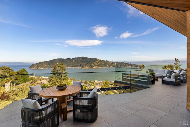 2215 Vistazo St E, Tiburon, CA 94920 - view of patio / terrace featuring an outdoor living space, a water and mountain view, and outdoor dining space