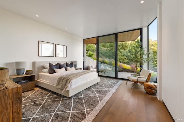 2215 Vistazo St E, Tiburon, CA 94920 - bedroom featuring access to exterior, floor to ceiling windows, dark wood finished floors, and recessed lighting