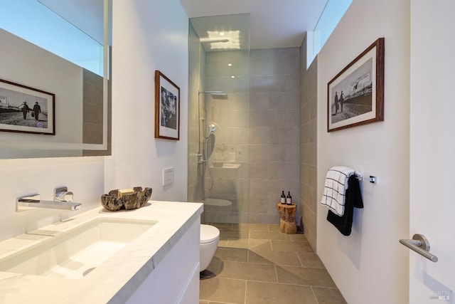 2215 Vistazo St E, Tiburon, CA 94920 - bathroom with walk in shower, toilet, vanity, and tile patterned flooring