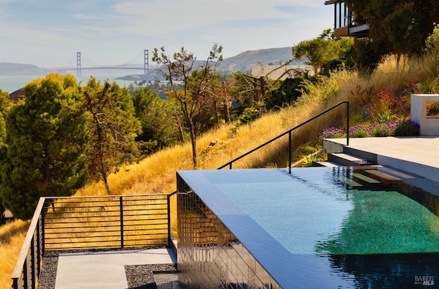2215 Vistazo St E, Tiburon, CA 94920 - view of home's community with a swimming pool and a mountain view