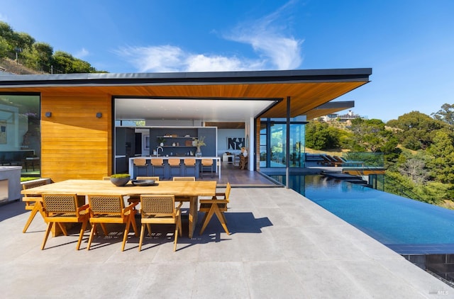 2215 Vistazo St E, Tiburon, CA 94920 - view of patio / terrace featuring a sink and outdoor dining space