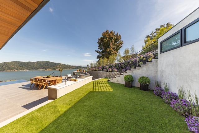 2215 Vistazo St E, Tiburon, CA 94920 - view of green lawn with a water view and a patio area