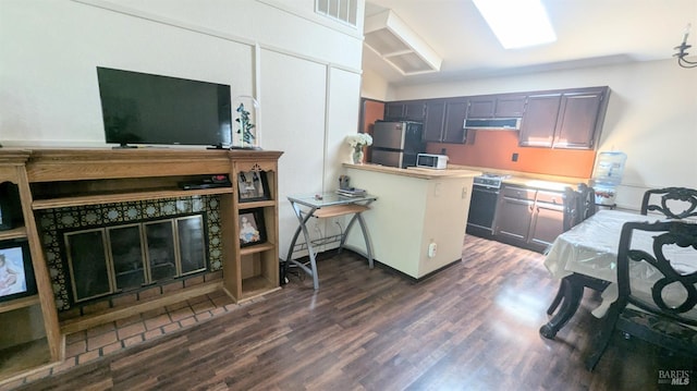 1084 Rubicon Way, Santa Rosa, CA 95401 - kitchen featuring freestanding refrigerator, dark wood-style floors, range hood, a peninsula, and light countertops