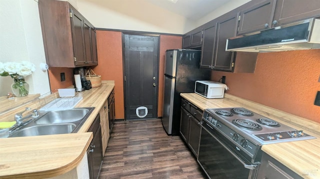 1084 Rubicon Way, Santa Rosa, CA 95401 - kitchen featuring electric range oven, under cabinet range hood, white microwave, dark wood-style flooring, and freestanding refrigerator