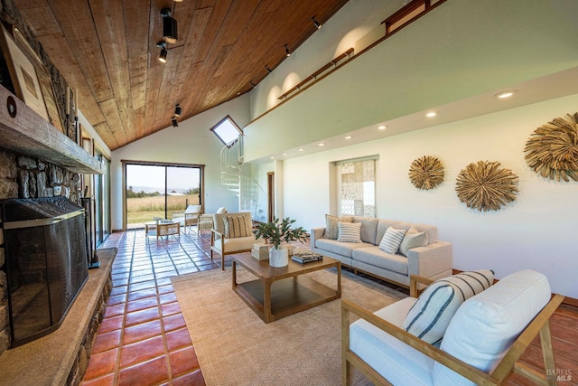 5900 Blank Rd, Sebastopol, CA 95472 - tiled living room with wood ceiling, high vaulted ceiling, recessed lighting, and a fireplace with raised hearth