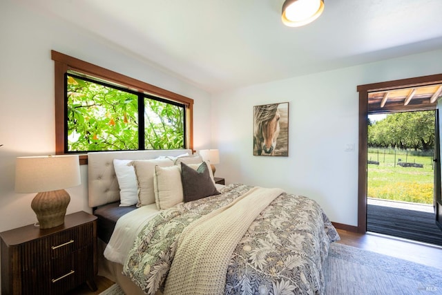 5900 Blank Rd, Sebastopol, CA 95472 - bedroom with access to exterior, baseboards, and wood finished floors