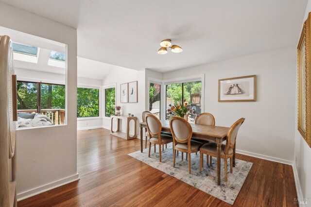 280 Oakcrest Rd, San Anselmo, CA 94960 - dining area featuring wood finished floors, baseboards, and vaulted ceiling