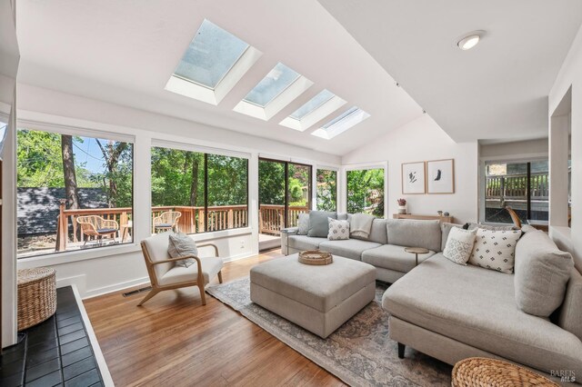 280 Oakcrest Rd, San Anselmo, CA 94960 - living room featuring a skylight, lofted ceiling, wood finished floors, and recessed lighting