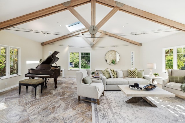 41 Cypress Rd, Point Reyes Station, CA 94956 - living area with healthy amount of natural light, a skylight, baseboards, and light stone finish flooring