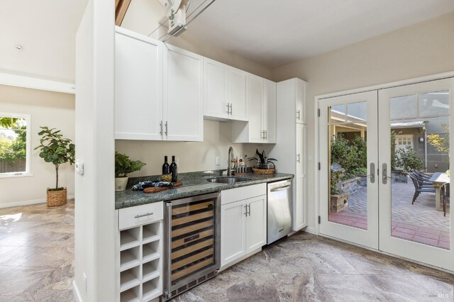 41 Cypress Rd, Point Reyes Station, CA 94956 - indoor wet bar featuring beverage cooler, dishwasher, light stone finish floors, french doors, and baseboards