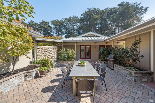 41 Cypress Rd, Point Reyes Station, CA 94956 - view of patio featuring french doors, a grill, and outdoor dining area