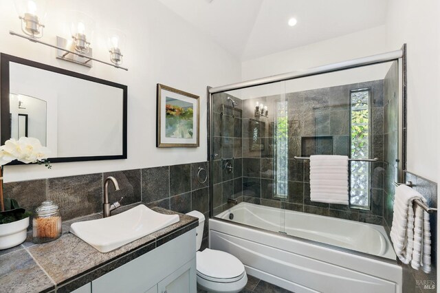 41 Cypress Rd, Point Reyes Station, CA 94956 - bathroom with combined bath / shower with glass door, vanity, toilet, and tile walls