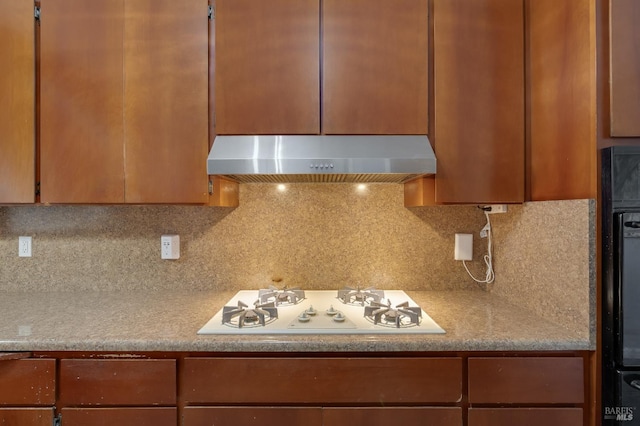 1225 Arkansas St, Vallejo, CA 94590 - kitchen featuring white gas stovetop, range hood, light countertops, and decorative backsplash