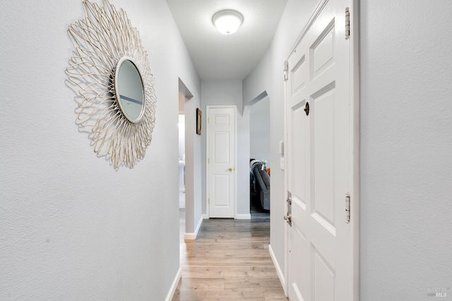 1225 Arkansas St, Vallejo, CA 94590 - hallway with light wood-type flooring and baseboards