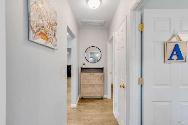 1225 Arkansas St, Vallejo, CA 94590 - hallway with light wood-style flooring and baseboards