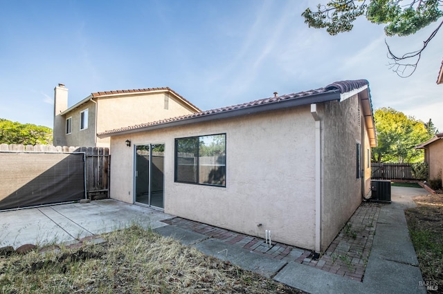 2728 Almondwood Way, Fairfield, CA 94534 - rear view of property with central AC, a patio area, a chimney, and stucco siding