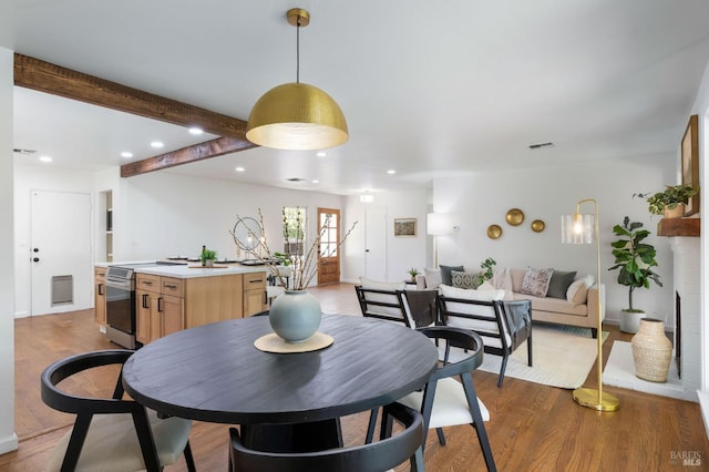 1109 Broadmoor Dr, Napa, CA 94558 - dining space featuring recessed lighting, wood finished floors, beam ceiling, and baseboards