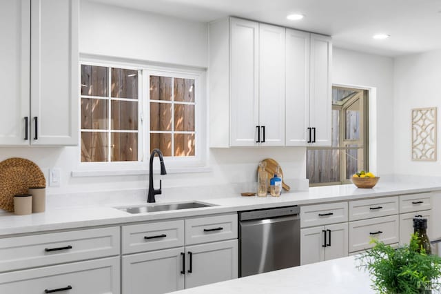 1109 Broadmoor Dr, Napa, CA 94558 - kitchen featuring stainless steel dishwasher, a sink, white cabinetry, light countertops, and recessed lighting