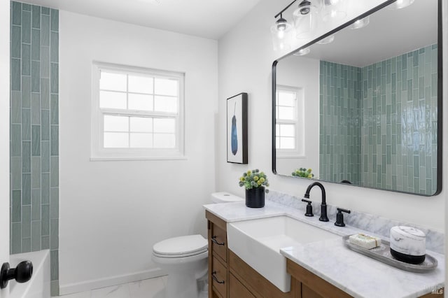 1109 Broadmoor Dr, Napa, CA 94558 - bathroom with toilet, marble look tile flooring, vanity, and baseboards