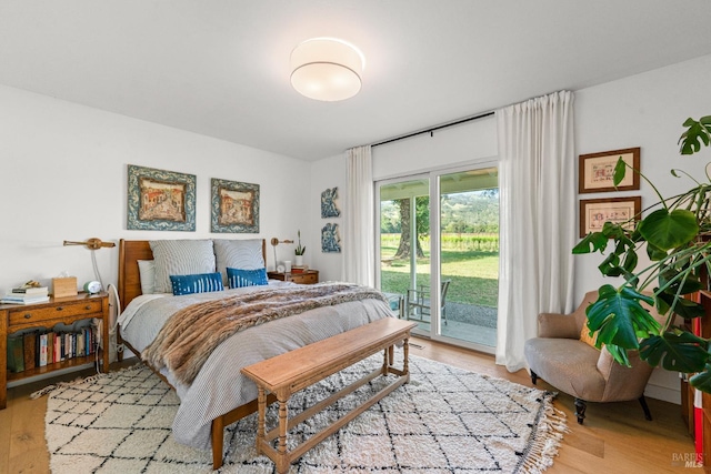 21800 River Rd, Geyserville, CA 95441 - bedroom featuring access to outside and light wood-style flooring