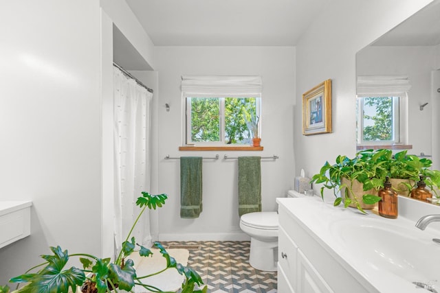 21800 River Rd, Geyserville, CA 95441 - bathroom featuring vanity, toilet, and tile patterned floors