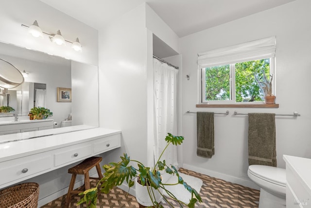 21800 River Rd, Geyserville, CA 95441 - full bath with toilet, vanity, a shower with shower curtain, and baseboards