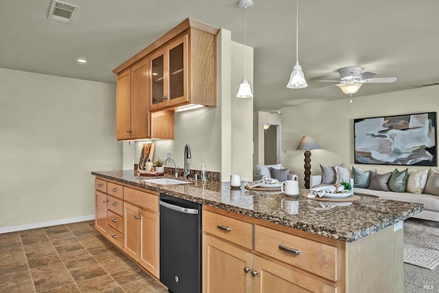 687 Cabot Way, Napa, CA 94559 - kitchen with dishwashing machine, a sink, open floor plan, baseboards, and dark stone countertops