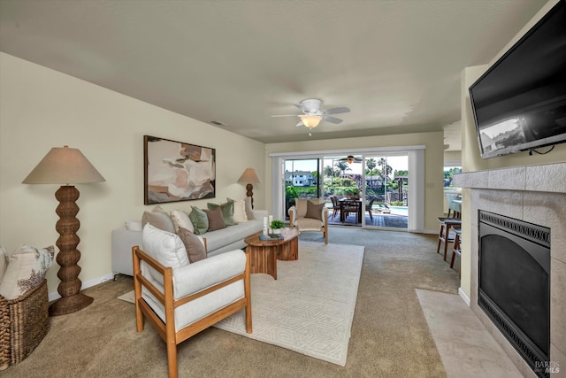 687 Cabot Way, Napa, CA 94559 - living room with a tile fireplace, a ceiling fan, carpet floors, and baseboards