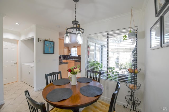 433 Freeway Dr, Napa, CA 94558 - dining space featuring independent washer and dryer, a chandelier, light tile patterned flooring, crown molding, and baseboards