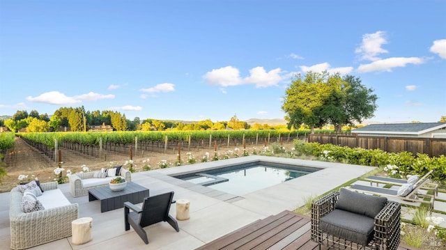 1597 Arrowhead Dr, Saint Helena, CA 94574 - view of pool with an outdoor living space, a fenced backyard, agricultural plots, a view of countryside, and a pool with connected hot tub