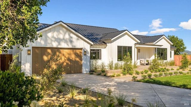 1597 Arrowhead Dr, Saint Helena, CA 94574 - modern farmhouse with a standing seam roof, an attached garage, driveway, and metal roof
