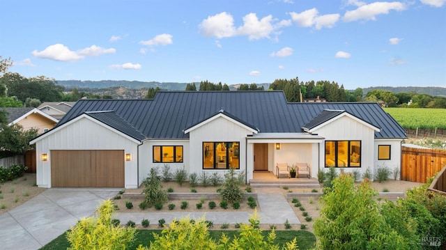1597 Arrowhead Dr, Saint Helena, CA 94574 - modern farmhouse featuring a standing seam roof, metal roof, board and batten siding, and an attached garage
