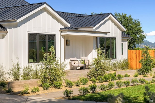 1597 Arrowhead Dr, Saint Helena, CA 94574 - view of exterior entry with a standing seam roof, metal roof, and covered porch
