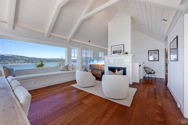 22 Eucalyptus Rd, Belvedere, CA 94920 - living room featuring a premium fireplace, wood finished floors, beam ceiling, baseboards, and high vaulted ceiling