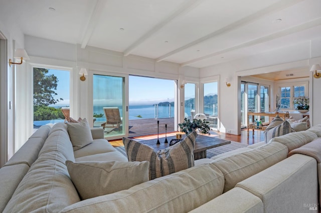 22 Eucalyptus Rd, Belvedere, CA 94920 - living room featuring a water view, beam ceiling, and wood finished floors