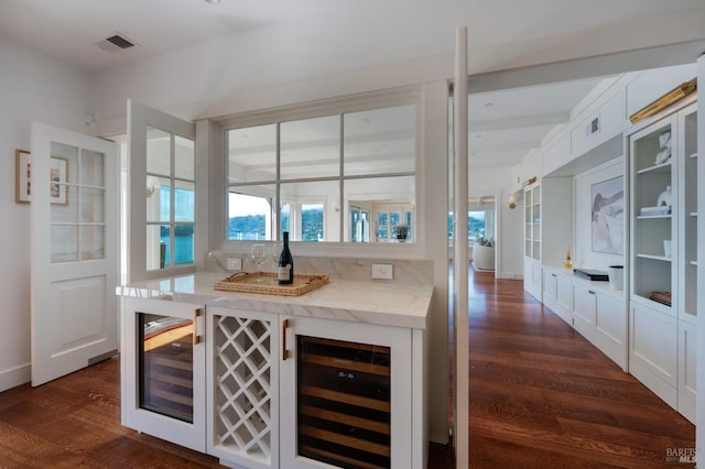 22 Eucalyptus Rd, Belvedere, CA 94920 - indoor dry bar featuring beverage cooler and dark wood finished floors