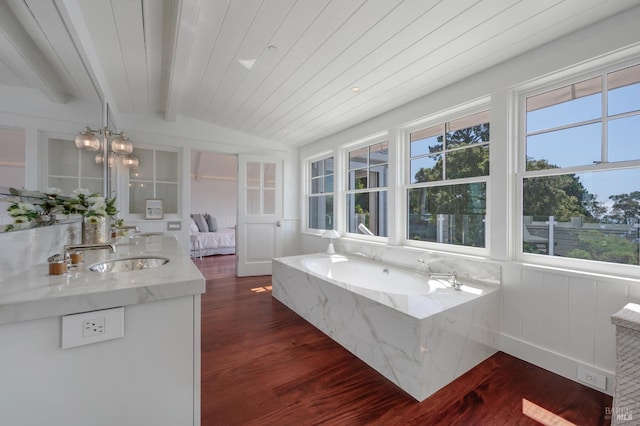 22 Eucalyptus Rd, Belvedere, CA 94920 - full bath featuring wood finished floors, a garden tub, and vanity