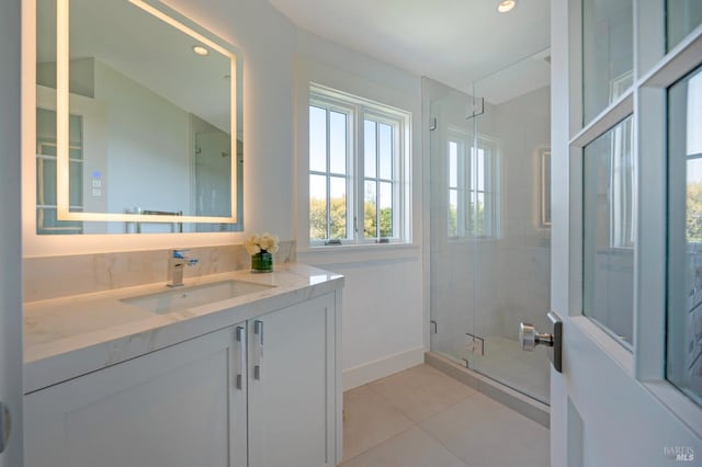 22 Eucalyptus Rd, Belvedere, CA 94920 - bathroom featuring tile patterned flooring, a shower stall, vanity, recessed lighting, and baseboards