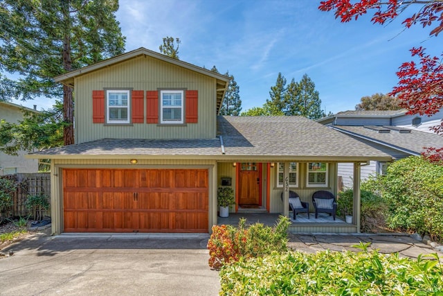 632 E K St, Benicia, CA 94510 - view of front facade featuring a porch, driveway, a shingled roof, and an attached garage